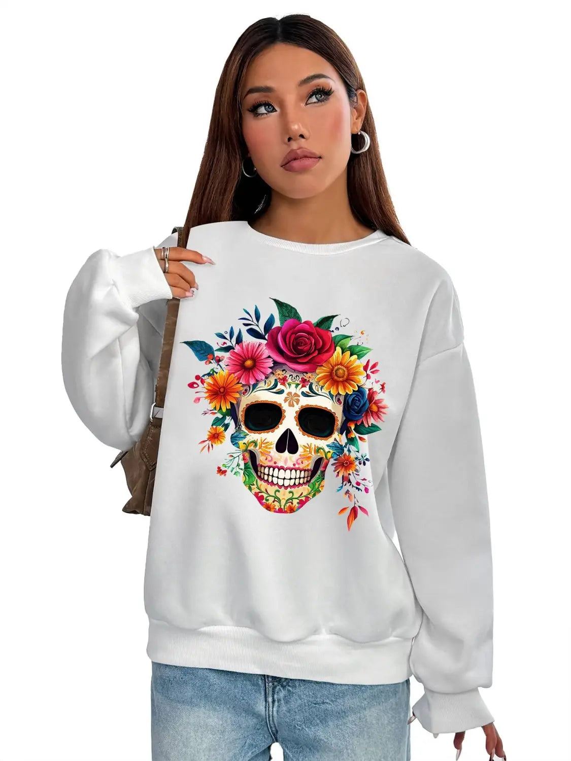White crew neck sweatshirt for daily wear featuring a vibrant colorful floral skull design on a basic long sleeve fabric.