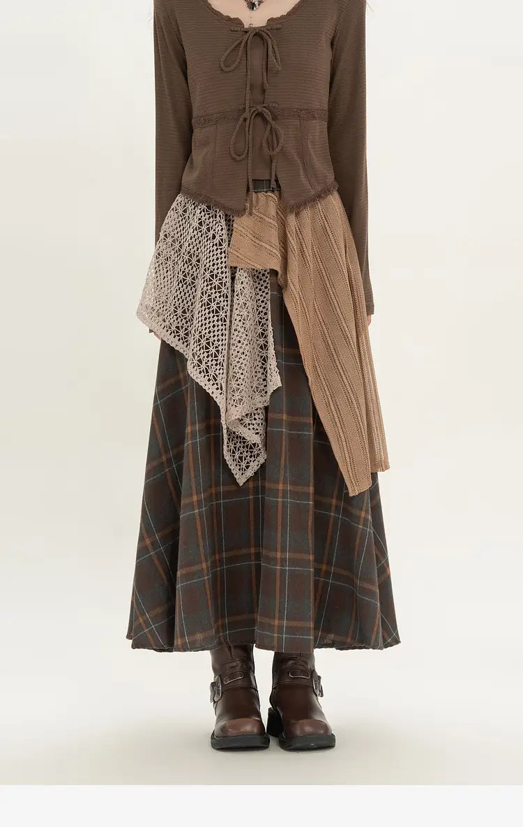 brown long-sleeved ribbed top with tied front layered over a retro minority irregular plaid a line skirt.