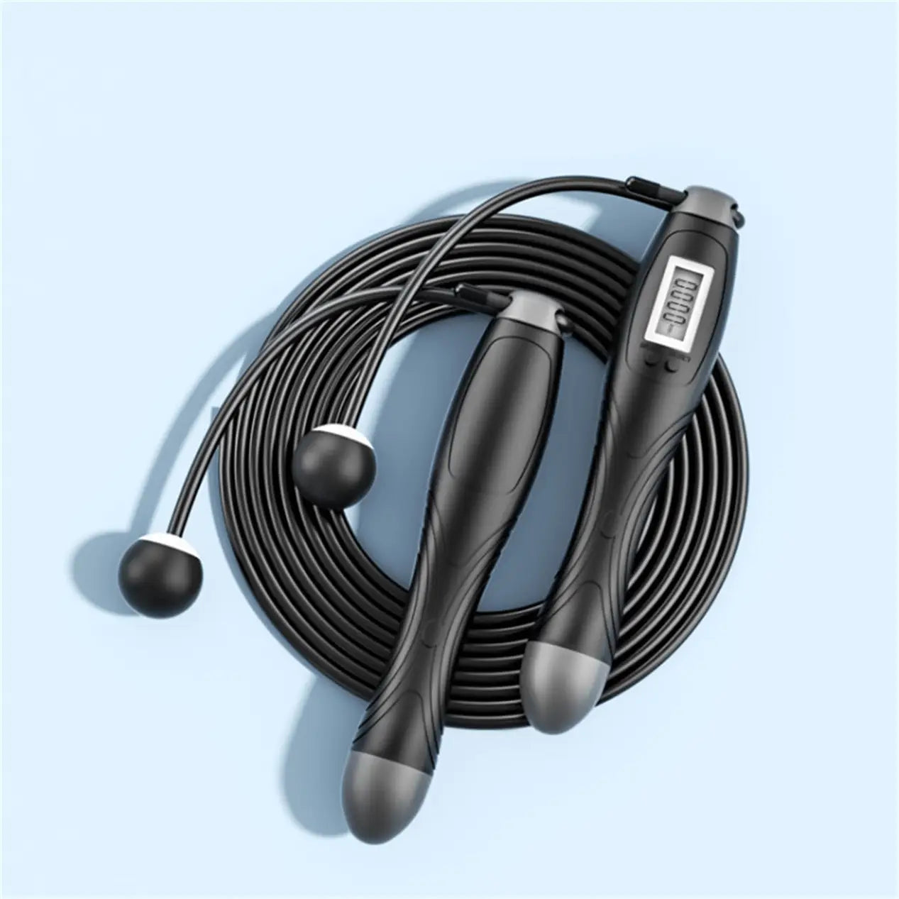 Black cordless electronic skipping rope with textured grips and a small screen on one handle designed for efficient indoor and outdoor workouts.