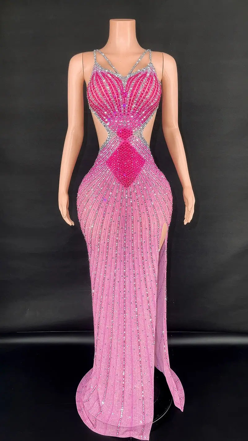 a shimmering pink beaded evening gown with a fitted silhouette featuring intricate silver sequin detailing along the bodice and skirt in the sling super shiny light diamond beaded gown collection