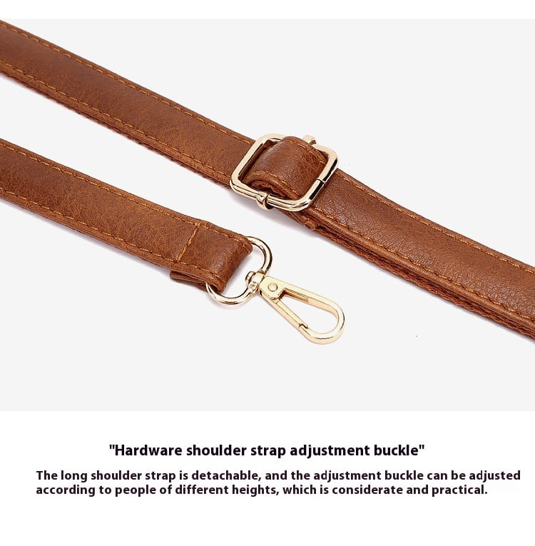 Brown leather shoulder strap with gold-tone metal buckle and swivel hook for large capacity luxury women leather hobo bag