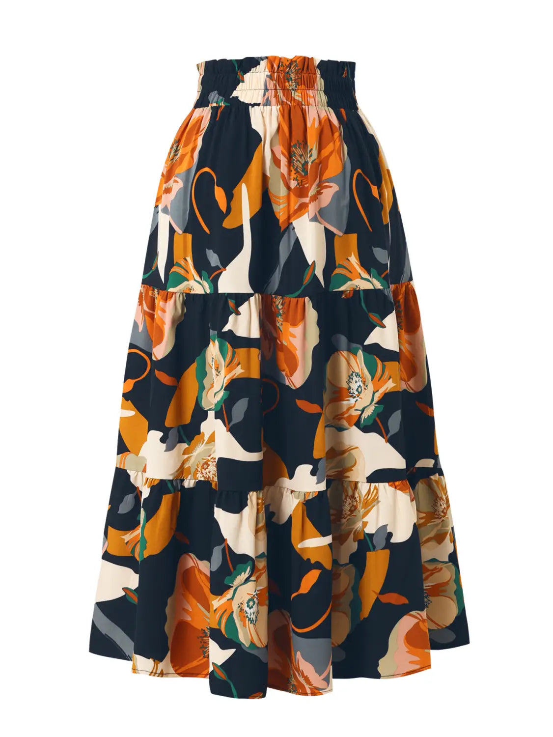 a navy blue tiered maxi skirt featuring a bold pleated floral print with orange cream and green blossoms and a floral print elastic waist