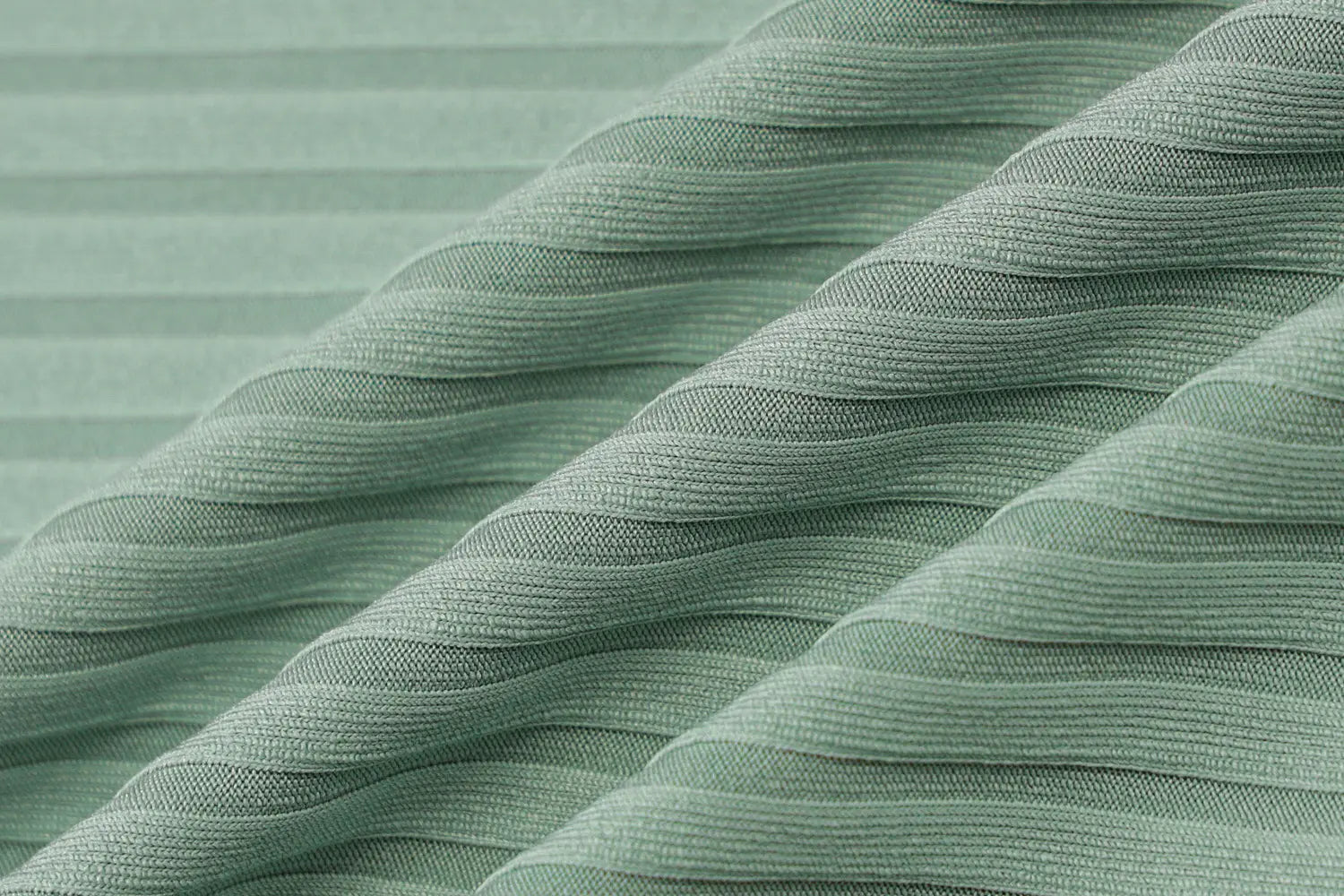a soft mint-green pleated fabric with a delicate woven texture featured in an olive green stripe knitted women sleeveless dress