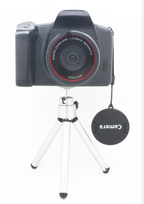 Black xj05 digital video camera with red lens ring and videolens branding mounted on a silver tripod featuring a 4x zoom lens.