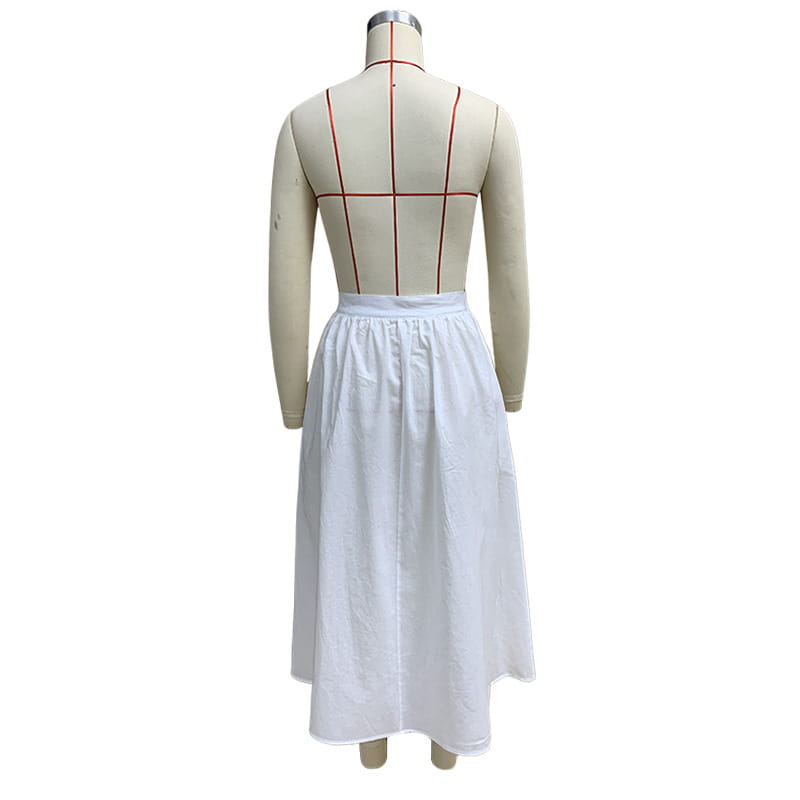 white cotton linen midi skirt with a slimming large hem and fitted waistband featuring a full flowing silhouette