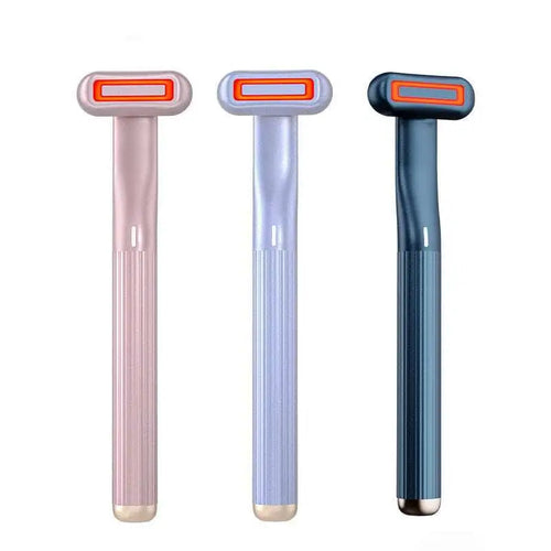 Three sleek modern 5-in-1 rotary eye massage wands in rose gold lavender and navy blue with therapeutic warmth heads
