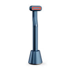 Blue rotary eye massage handpiece with therapeutic warmth and orange light in a rose gold 5-in-1 base