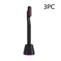 Black electric toothbrush with purple accents featuring rotary eye massage and therapeutic warmth functions