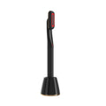 Black 5-in-1 rotary eye massage wand with therapeutic warmth featuring red led lighting and rose gold accents