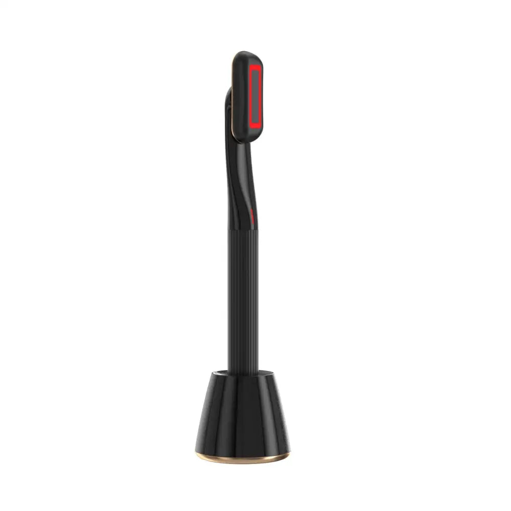 Black 5-in-1 rotary eye massage wand with therapeutic warmth featuring red led lighting and rose gold accents