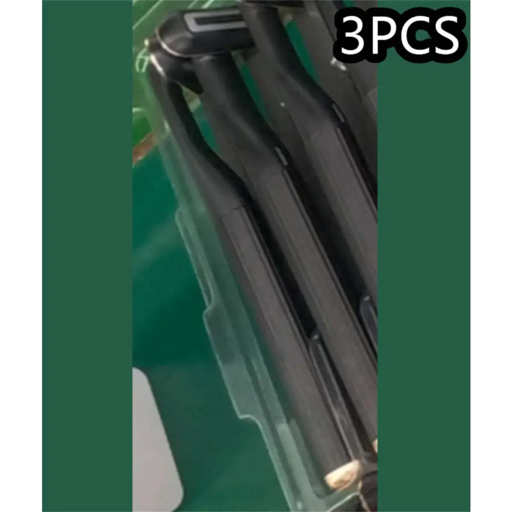 Black plastic-handled hair straighteners with metallic plates next to a rose gold 5-in-1 rotary eye massage wand with therapeutic warmth