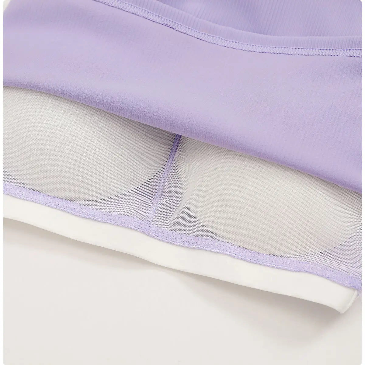 a lavender ribbed quick dry breathable running sports bra with padded cups and soft mesh panels designed for running sports activities