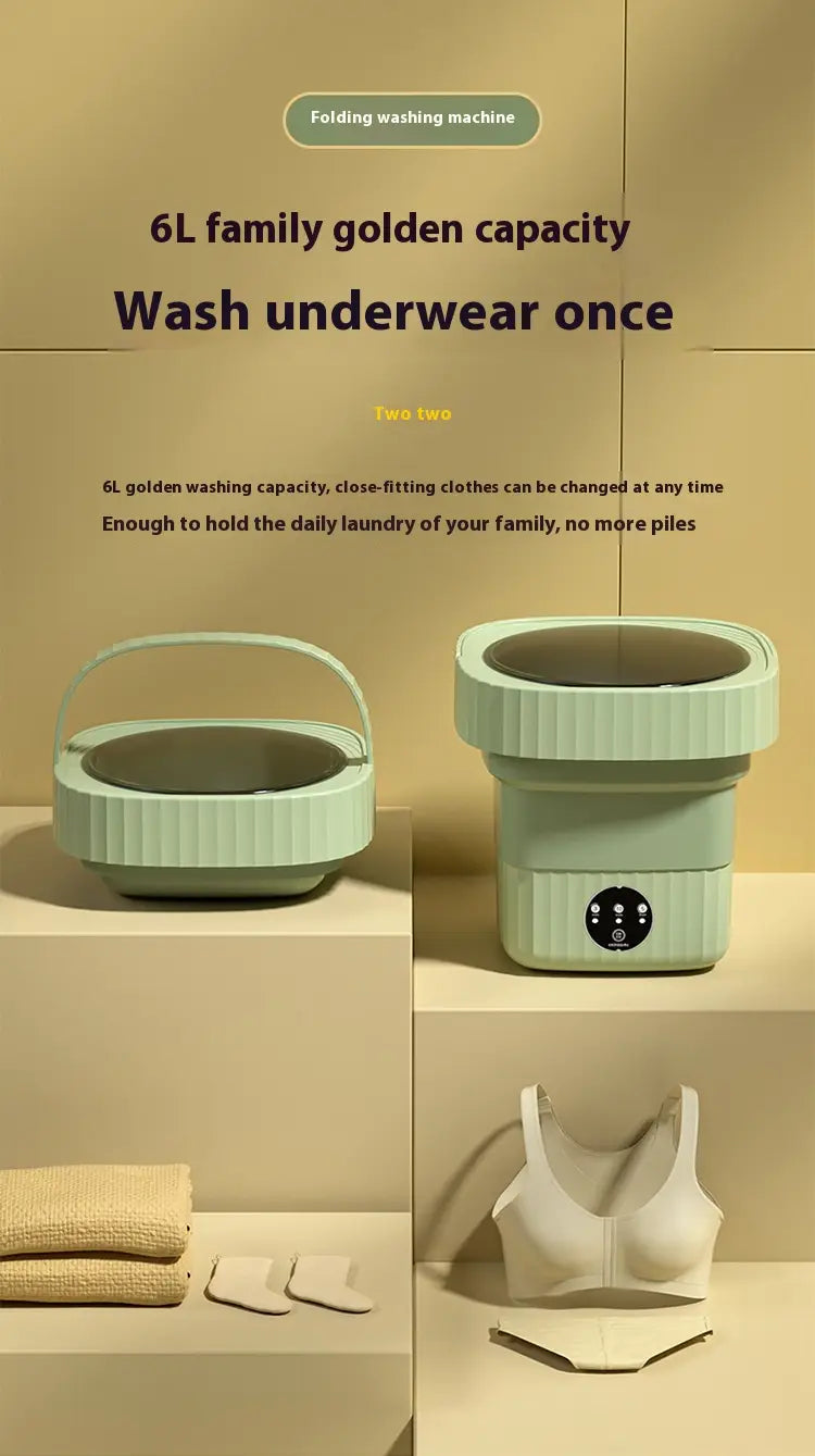Mint green ribbed folding washing machine with collapsible design and handle for convenient folding washing.