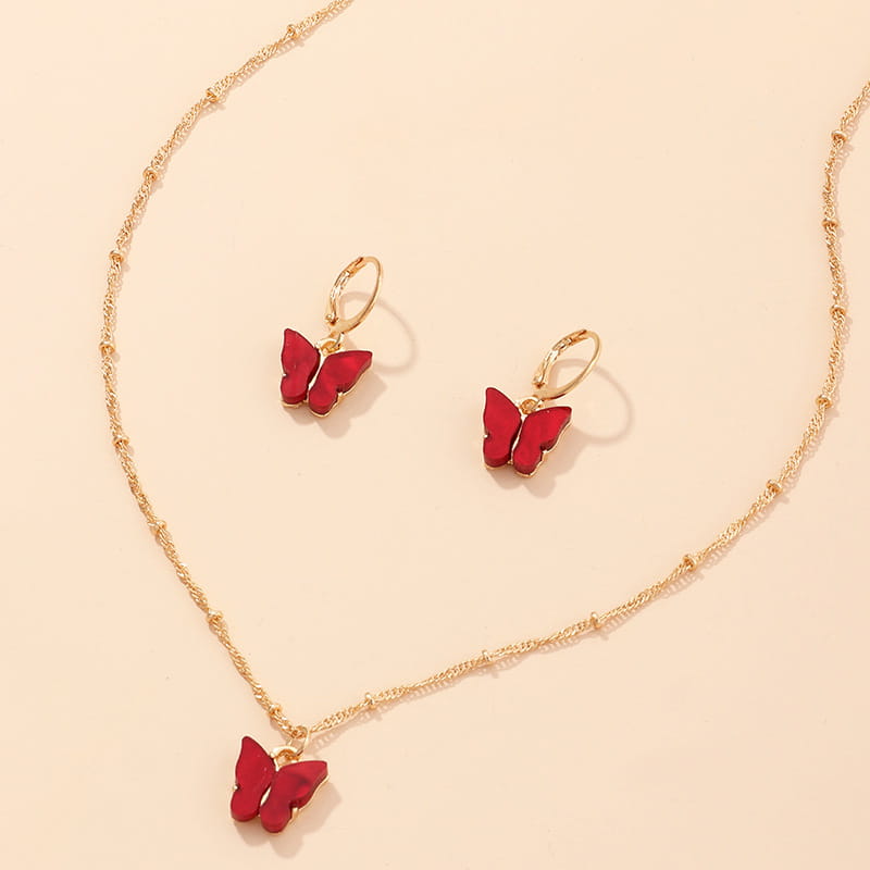 Gold chain necklace with red resin butterfly pendant and matching red fashion resin butterfly earrings from a creative fashion resin butterfly jewelry set.
