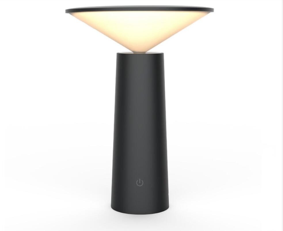 Black cylindrical minimalist touch table lamp usb led with a conical beige light diffuser designed for led reading.