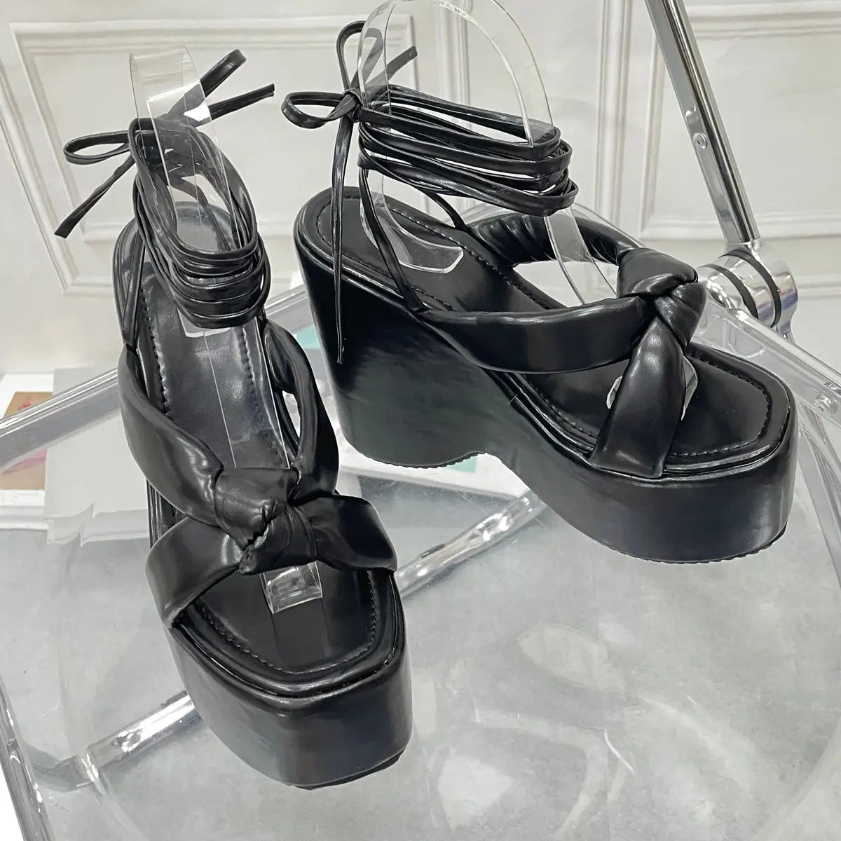 black platform wedge high sandals with glossy patent leather straps and thick chunky heel for stylish high heel platform wear
