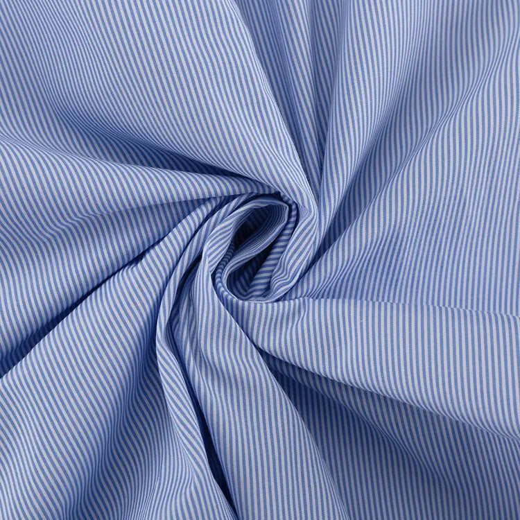 blue and white striped cotton fabric neatly folded into a spiral for lace splicing sling vest and big swing skirt set featuring splicing sling vest high-quality material