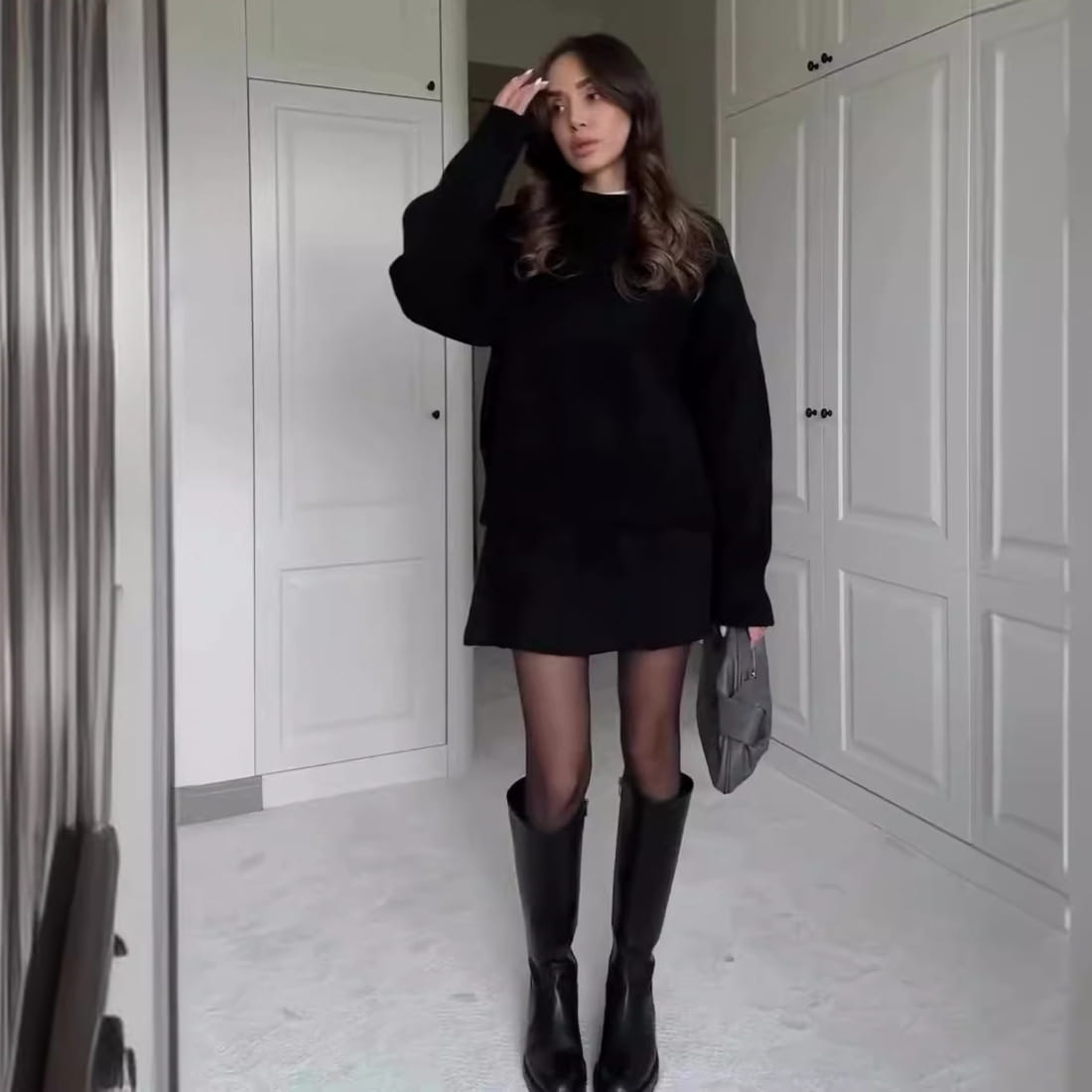 black knee-high leather boots complementing green long sleeve sweater skirt sets featuring knit casual pieces.