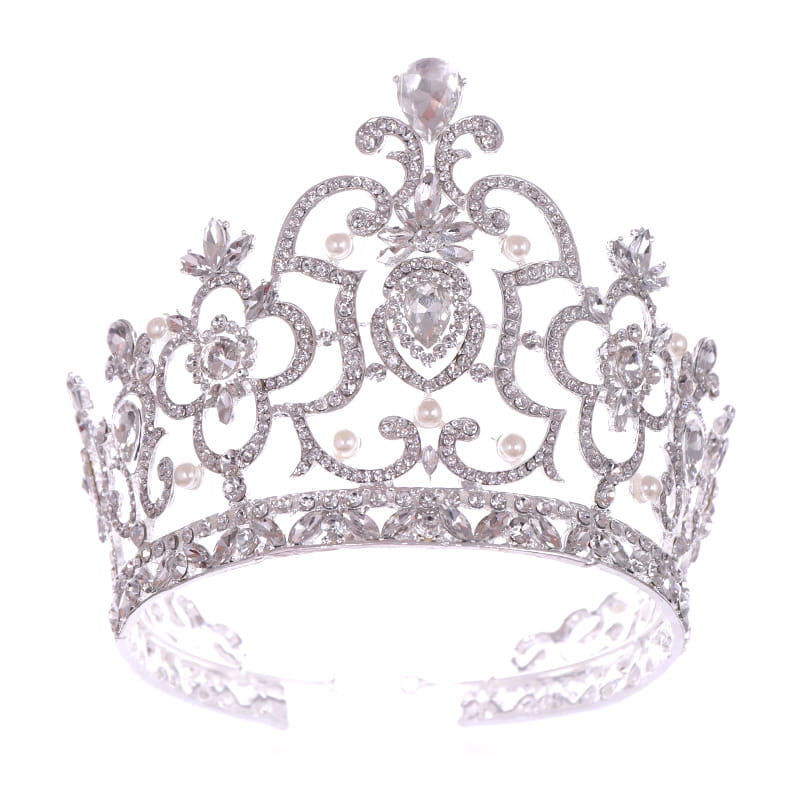 A sparkling silver crystal crown catwalk tiara adorned with intricate crystal and pearl embellishments.