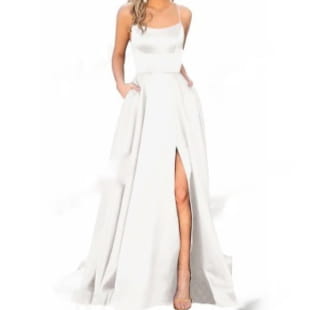 a solid color long white satin evening gown featuring a flowing high slit and a structured bodice ideal for a color long slimming look.
