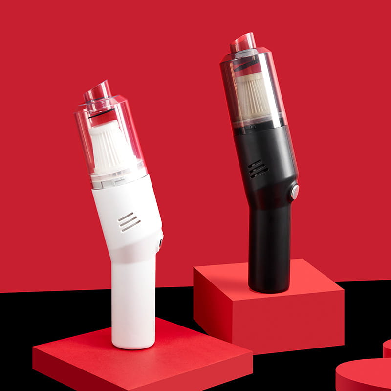 Two compact portable wet dry car vacuum cleaners in white and black with transparent cylindrical dust collection chambers and internal filters.