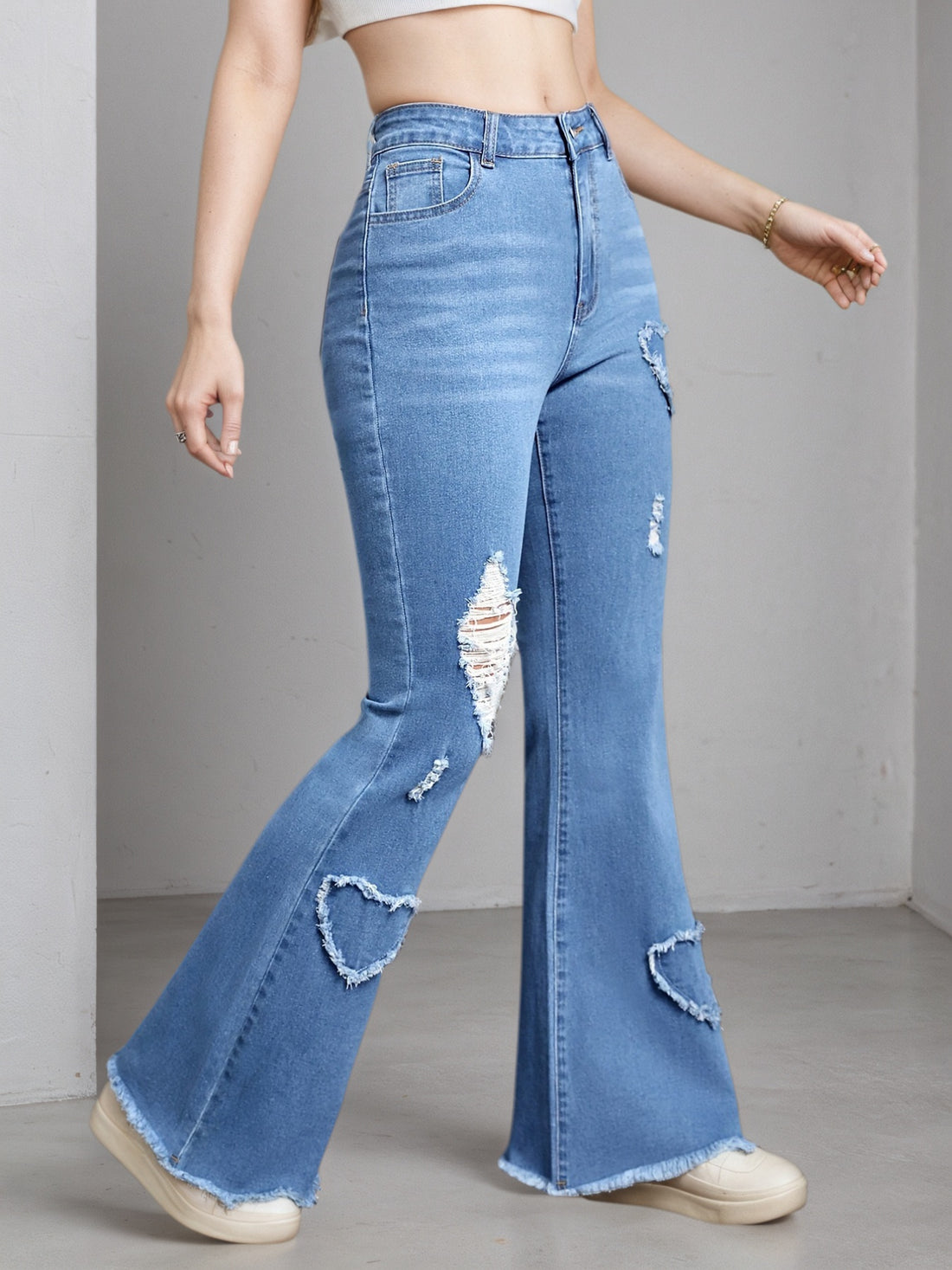 Women's light blue high-stretch flare jeans with heart embroidery – view 1