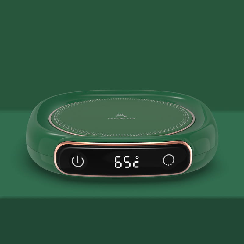 Emerald green ceramic electric cup warmer with a rose gold-trimmed digital display showing 65 degrees celsius designed as a milk heating insulation base desktop digital display.
