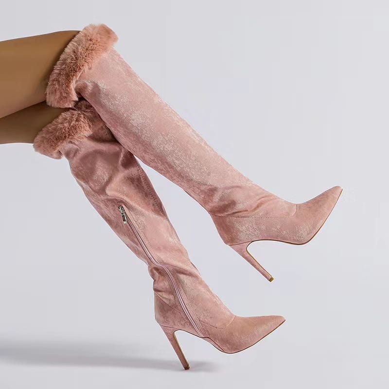 pink suede heel high boots with fluffy faux fur trim at the top featuring a pointed stiletto fine heel design