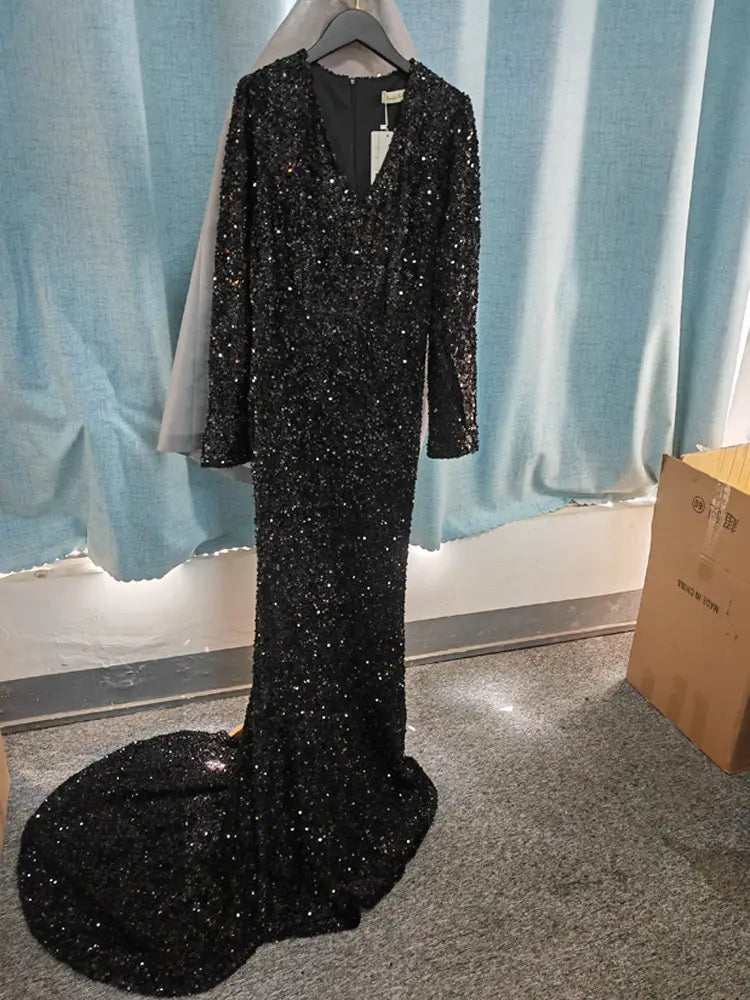 black sequined floor-length evening dress with long sleeves and v-neckline suitable as a grey long sleeve sequin mermaid evening dress alternative