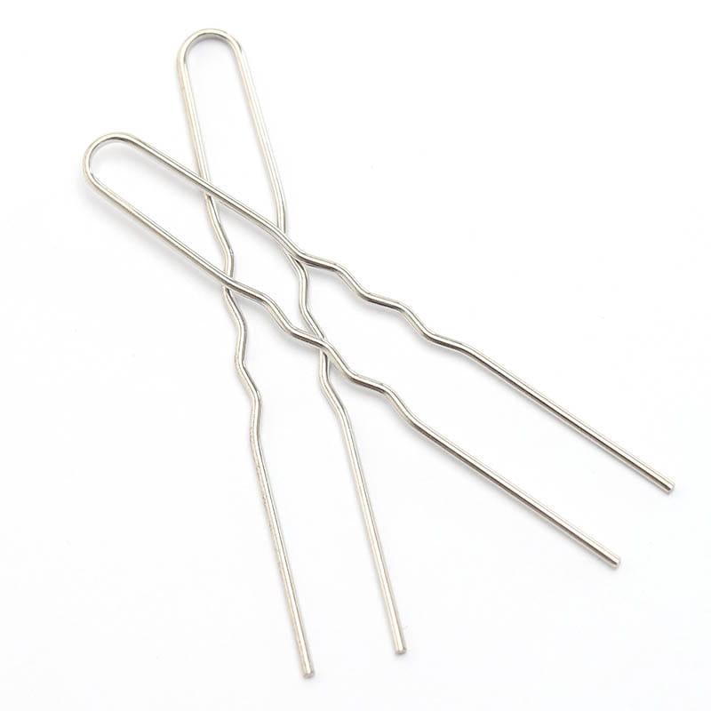 Silver metal bobby pins with a wavy twisted design as diy hair accessories material for creating stylish hair accessories.