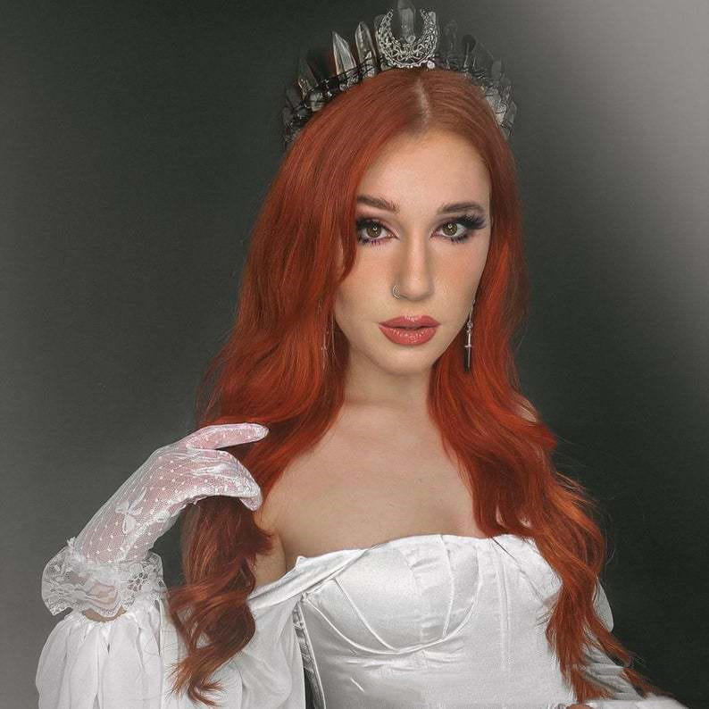white satin corset with lace-trimmed sleeves and a structured bodice paired with a smoky quartz crescent moon crystal crown tiara showcasing a crown tiara natural stone design