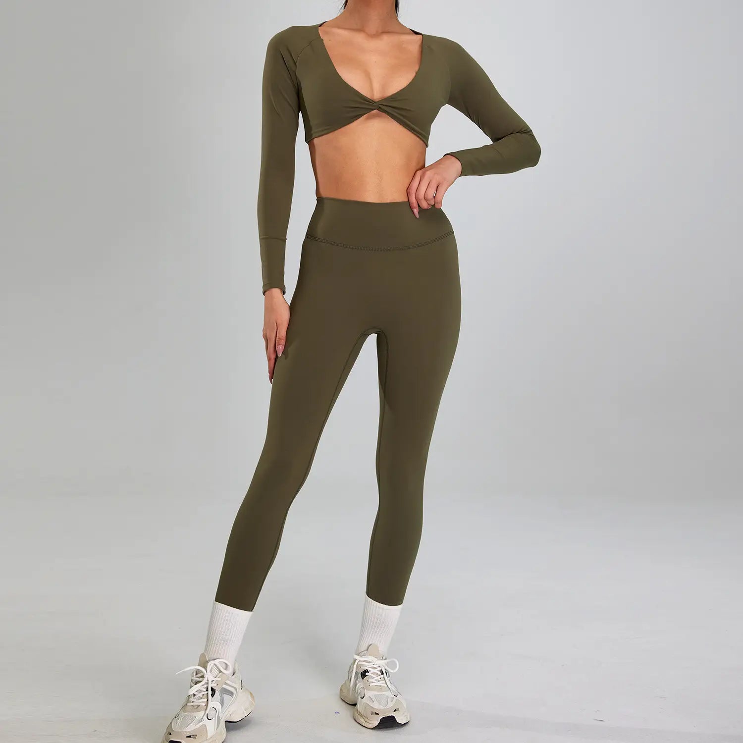 olive green long-sleeved crop top with twisted front design paired with maroon high waist suit outdoor running nude set for sports suit outdoor activities