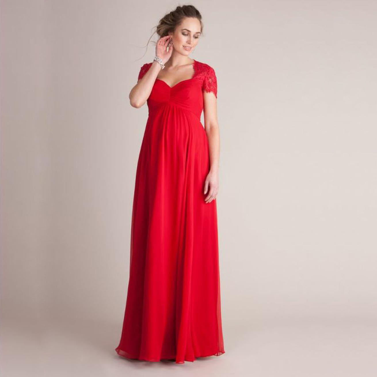 A flowing red chiffon wedding gown with eyelashes lace stitching lace cap sleeves and a sweetheart neckline made from stitching japanese cotton.