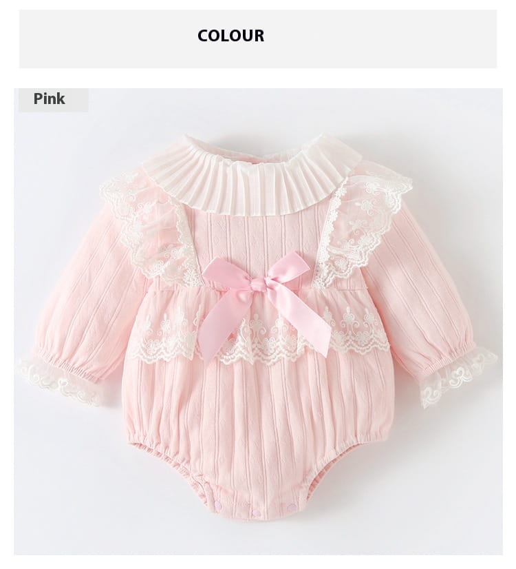 pink ribbed long sleeve newborn clothes jumpsuit with lace trim and a matching bow at the front suitable for autumn wear