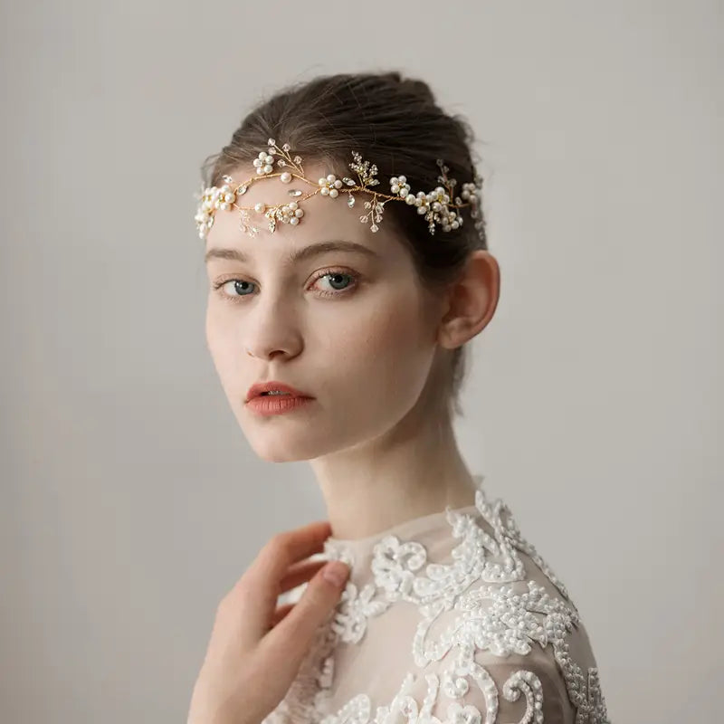 Delicate gold-toned pearl flower wedding headband adorned with tiny pearls and floral embellishments perfect as wedding headband accessories.