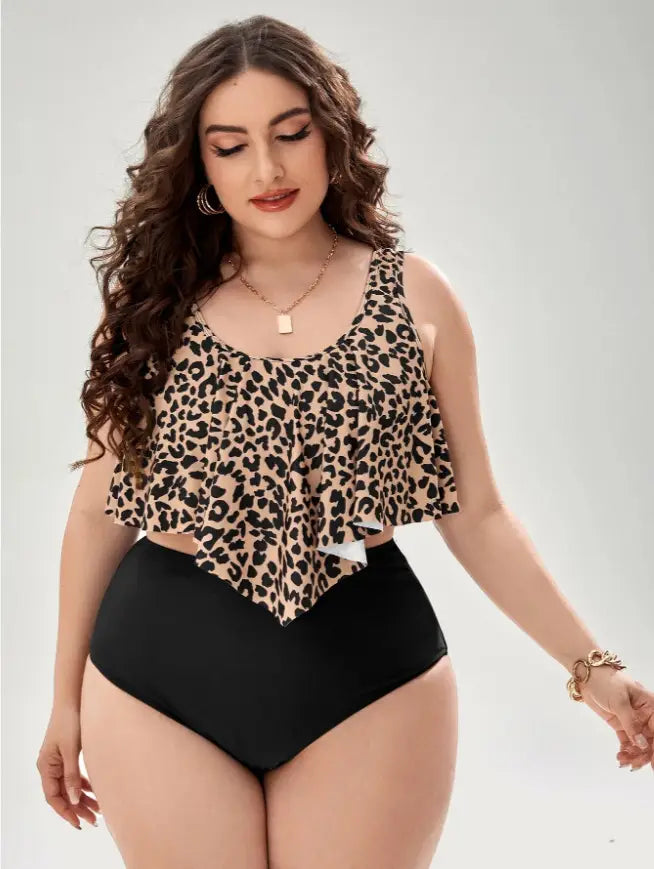 leopard print swimsuit featuring a ruffled tankini top in leopard print paired with high-waisted black swim bottoms suitable for stylish beachwear.