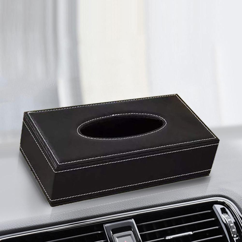 Black faux leather car tissue box cover with white stitching and a central oval opening for easy tissue access.