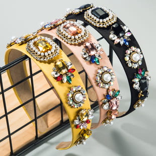 three decorative baroque colorful headbands adorned with sparkling rhinestones and pearls in gold pink and black colors