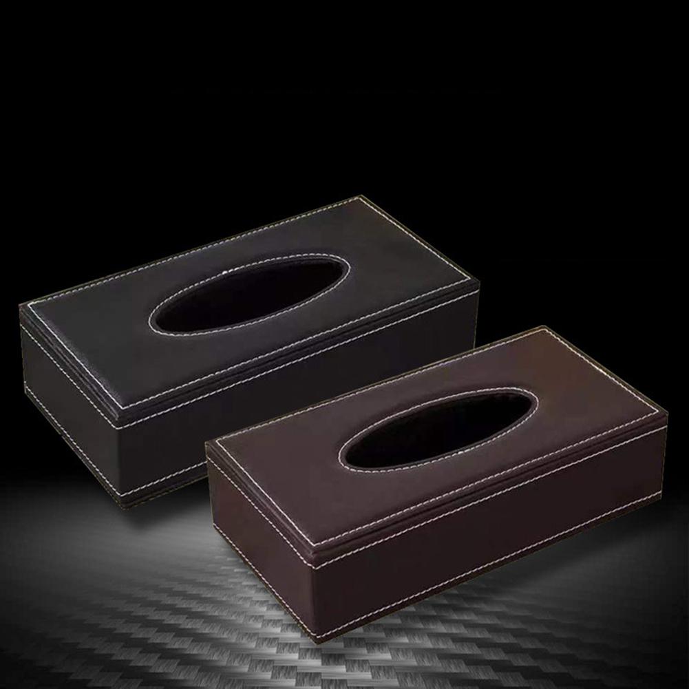 Two elegant leather tissue box covers in deep black and rich brown with precise white stitching designed as a car tissue box cover.