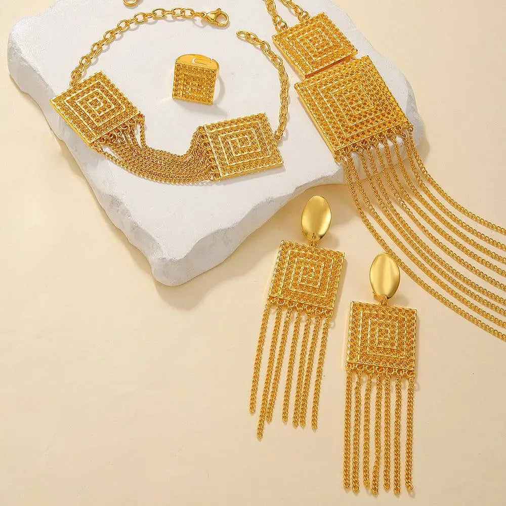 Fashion ladies 18k gold plated jewelry set featuring gold-toned geometric necklace with intricate mesh and chain fringe