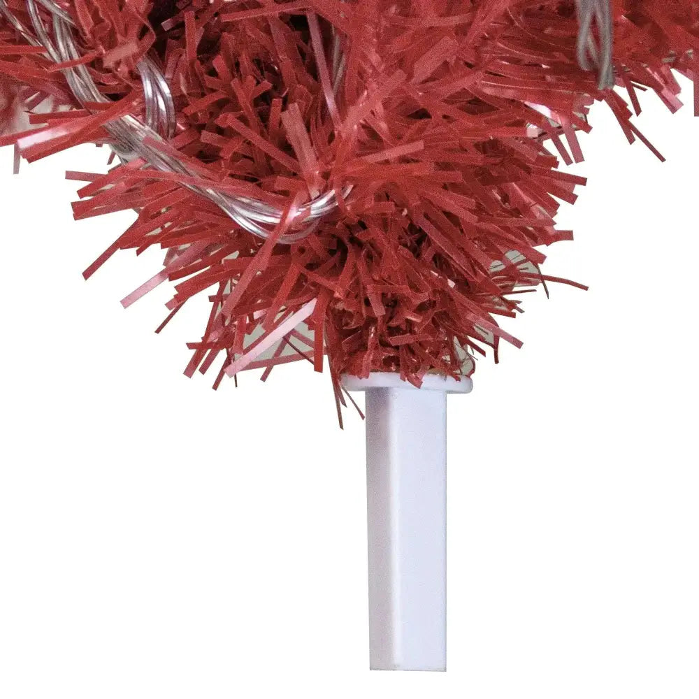 Vibrant red shiny tinsel pom pom with white plastic handle for use with foot articulated fir christmas tree and santa hat