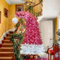 6 foot articulated fir christmas tree shaped like a santa hat in vibrant red and white with led lights