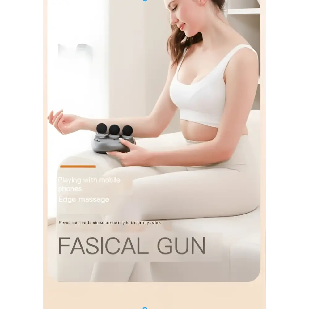 Gray handheld 6-head massage gun deep body massager with six black massage heads for muscle recovery use