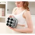 Silver and black 6-head massage gun deep with multiple circular nodes for targeted muscle recovery and relief