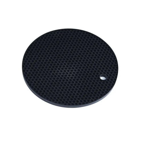 Black circular silicone mat trivet with honeycomb texture and side hole for 6 in 1 air fryer pizza pan and skewer rack