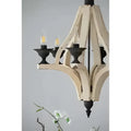 A light wood chandelier with distressed white wood and black metal accents featuring four candle-style bulbs for dining hall entrance