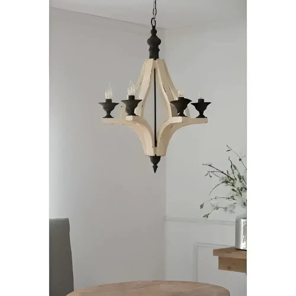 A rustic 6 light wood chandelier with distressed white wood frame and black metal accents for dining hall entrance