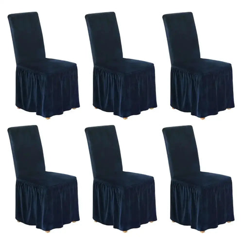 Six navy blue velvet dining chair covers with ruffled skirts for elegant velvet dining room decor