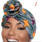 Vibrant printed headband elastic set featuring a colorful orange green and purple african print headwrap styled in a decorative knot
