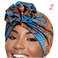 Vibrant printed headband elastic set featuring a blue and orange patterned headwrap with intricate paisley designs